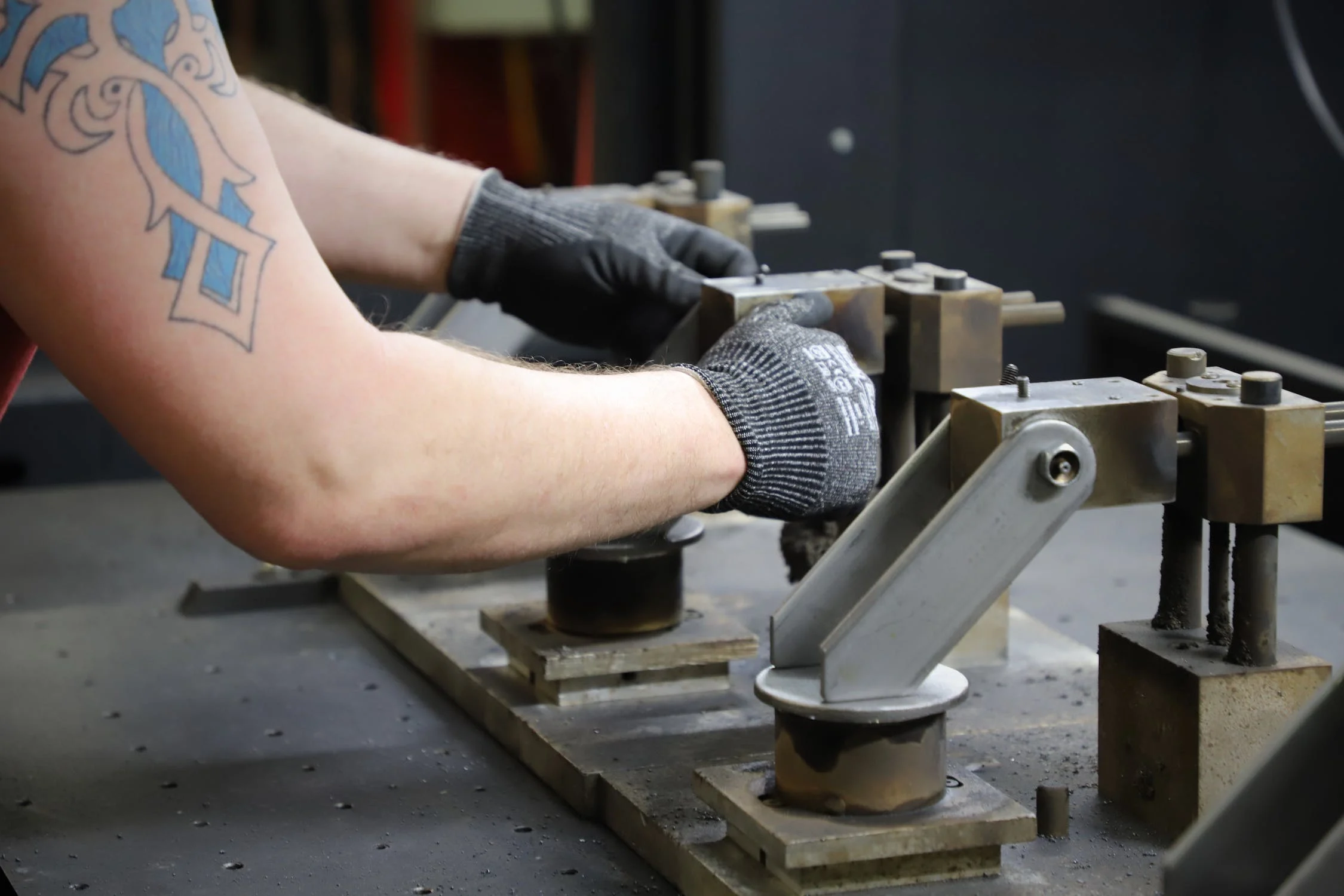 Factory Worker working on parts at the factory