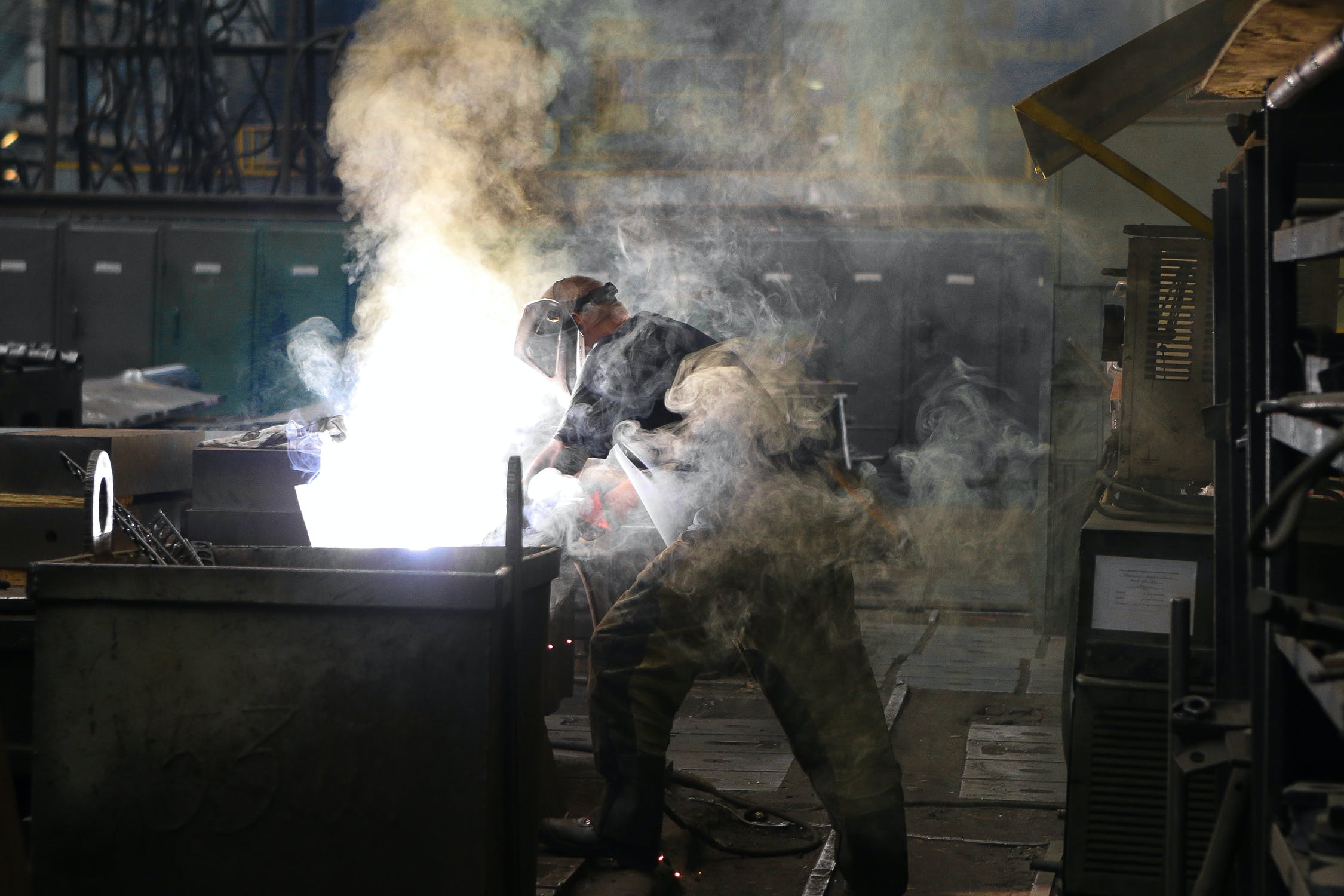 Man working on parts in the factory.